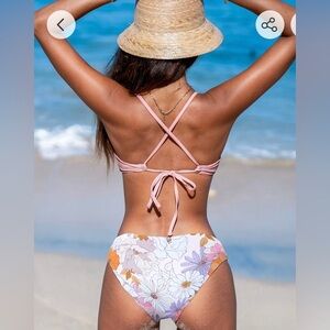 Bikini with reversible top and bottom, size small. New, never worn, tags removed